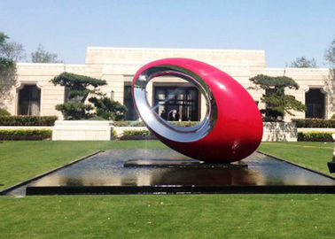 Un bon prix. Sculptures modernes en art de jardin de grande sphère extérieure ovale de sculpture peintes par rouge en métal en ligne