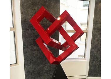 Un bon prix. Sculpture géométrique en Art moderne de sculpture peinte par rouge en métal pour la décoration en ligne