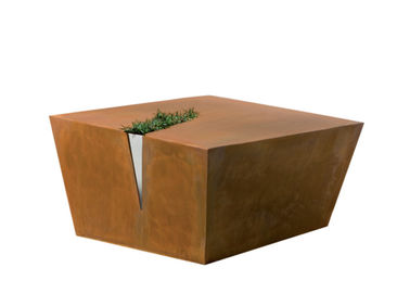Un bon prix. Le jardin rouillé extérieur en métal de table basse sculpte couleur en acier de Corten la diverse en ligne