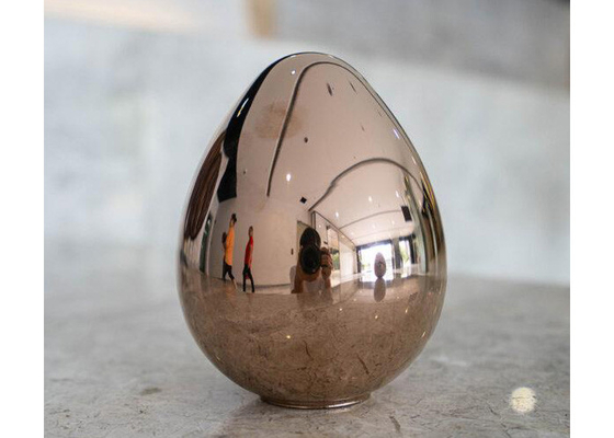 La main faite sur commande de taille a forgé le miroir ovale de sculpture en oeufs d'acier inoxydable poli