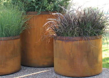 Un bon prix. Boîtes en acier rondes rouillées de planteurs de Corten de paysage pour la plaza imperméable en ligne