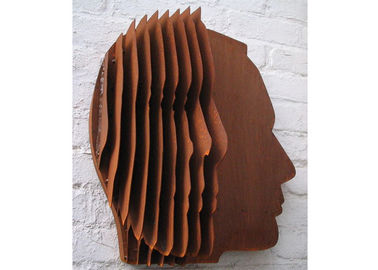 Un bon prix. Décoration en acier de mur de sculpture en visage de Corten de couleur rouillée abstraite en ligne