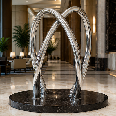 Un bon prix. Sculpture de tubes à double arc en acier inoxydable poli miroir, décor d'art abstrait moderne En ligne
